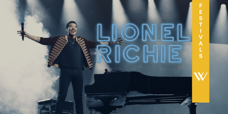 Lionel Richie live on stage next to a piano - Lionel Richie Live at Broadlands Estate